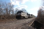 NS 7592 leads a short stack train at MP 124.4